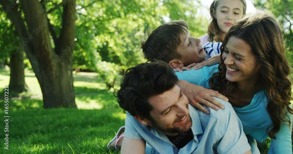 Family enjoying time together in the park Family enjoying time together in the park