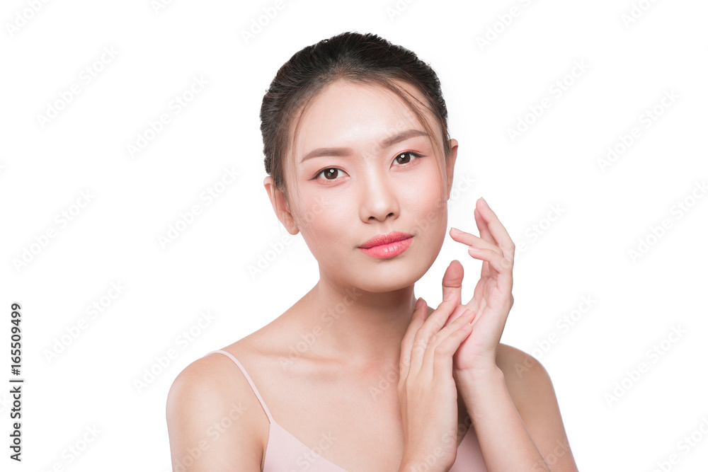 Beautiful woman model touching her face with natural makeup Beautiful woman model touching her face with natural makeup