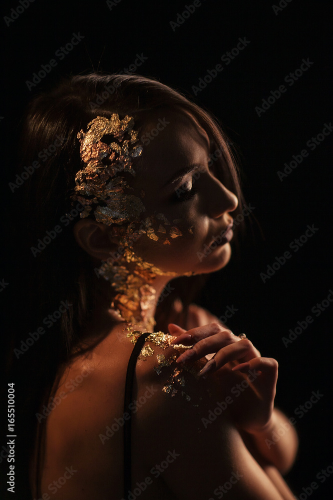 Portrait of a girl on a black background
