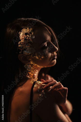 Portrait of a girl on a black background