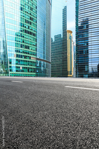 empty asphalt road and modern buildings in shanghai,china. © ABCDstock