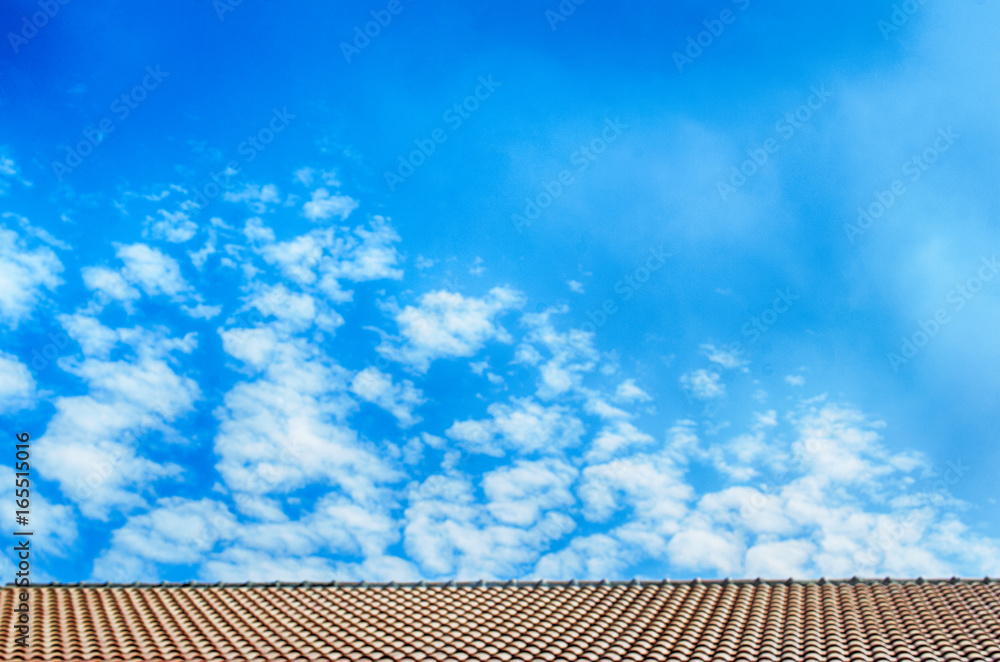 The Blue sky with cloudy on a home roof backgrounds The Blue sky with cloudy on a home roof backgrounds