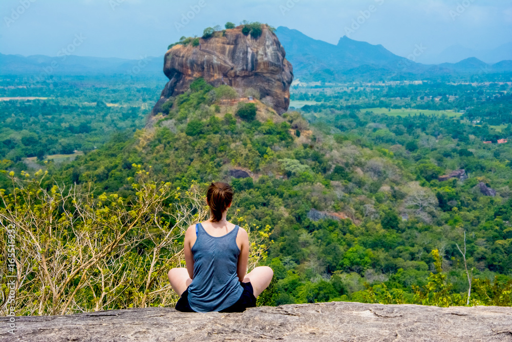 Naklejka premium Sigiriya Rock Fortress View From Pidurangala Rock. Pidurangala Rock Has An Amazing View Of Nearby Sigiriya, Which Looked Even More Impressive From The Height.