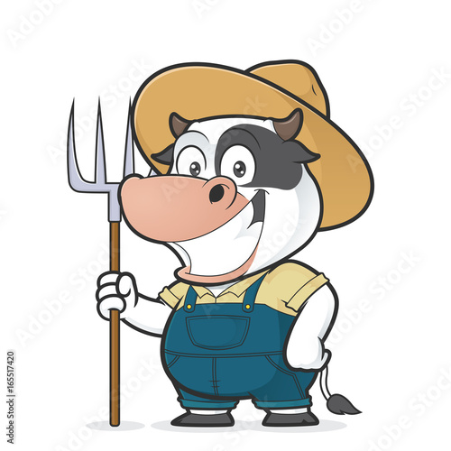 Cow farmer holding a rake
