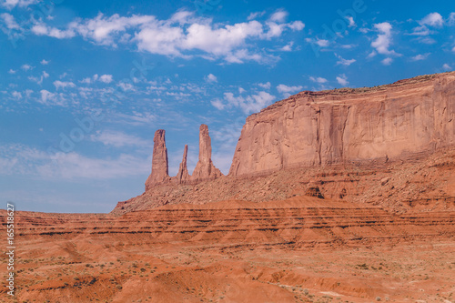 Rocks of the Monument Valley and the blue sky. Territory of the reservation of the indigenous population of the USA
