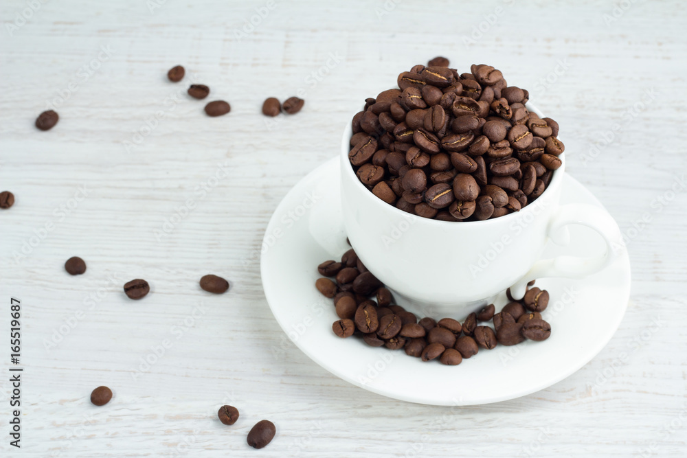 Coffee beans in a cup top view. Coffee beans in a cup top view.