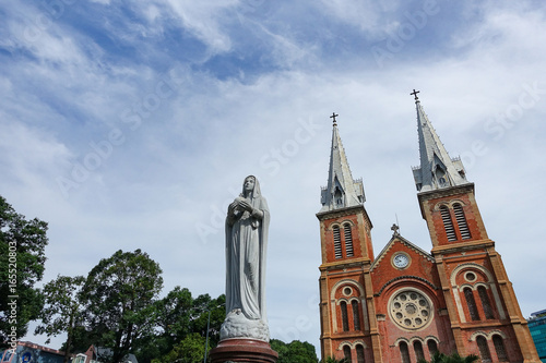 Notre Dame Cathedral (Vietnamese: Nha Tho Duc Ba) in a beautiful weather, build in 1883 in Ho Chi Minh city, Vietnam. HOCHIMINH CITY (SAI GON), VIET NAM - July 11, 2017
