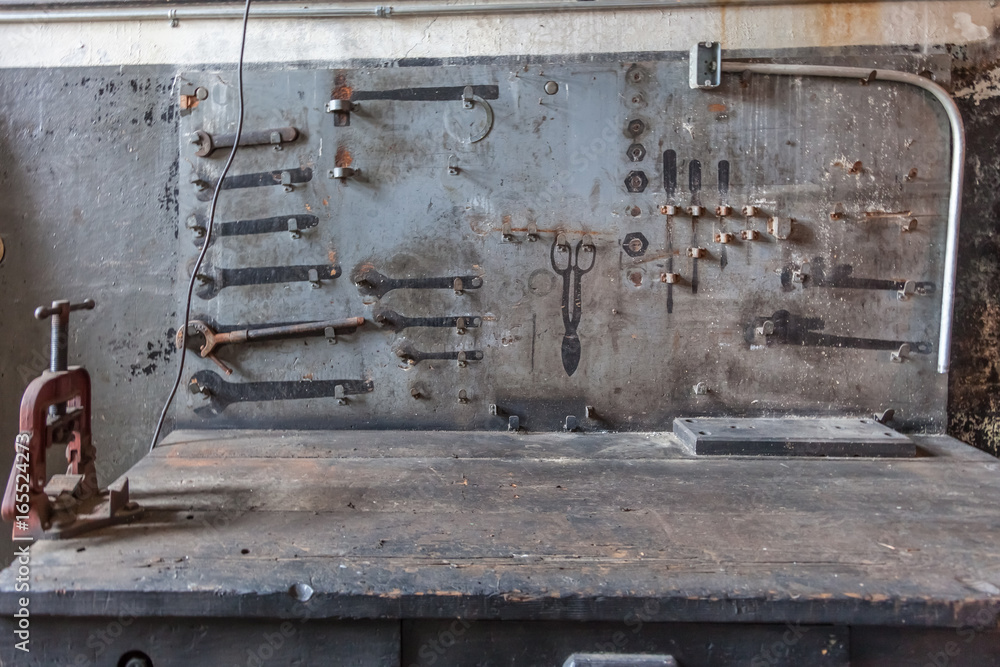 workbench in abandoned factory - obrazy, fototapety, plakaty 