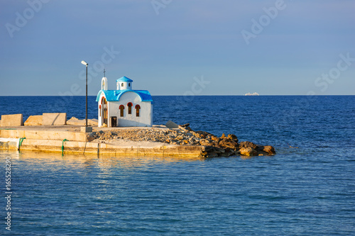 Beautiful chapel on the coast of Kato Galatas on Crete, Greece photo