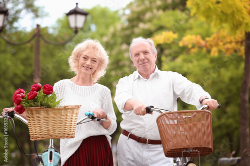 Senior couple walking with ...