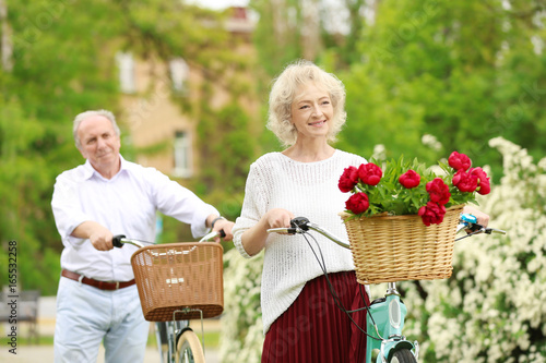 Senior couple walking with ...