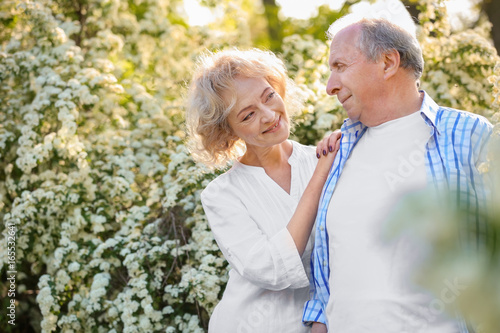 Happy senior couple near bl...
