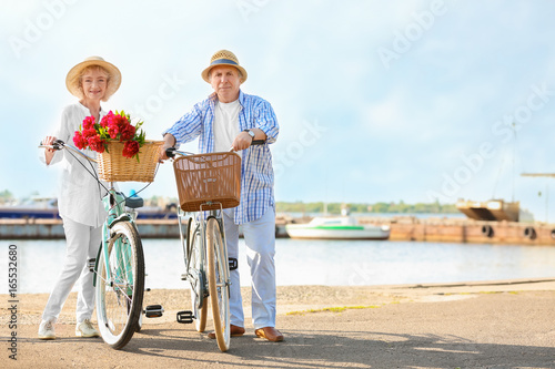 Happy senior couple with th...