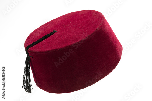 Traditional Turkish hat called fez isolated on white background. 
