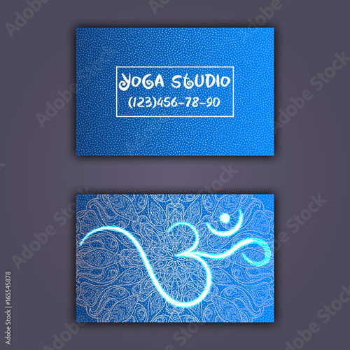Business card for yoga studio or yoga instructor. Ethnic background with mandala ornament and ohm