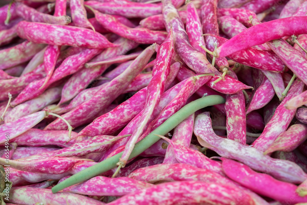 Red sweet peas for sale at local street market. Provence. France Red sweet peas for sale at local street market. Provence. France