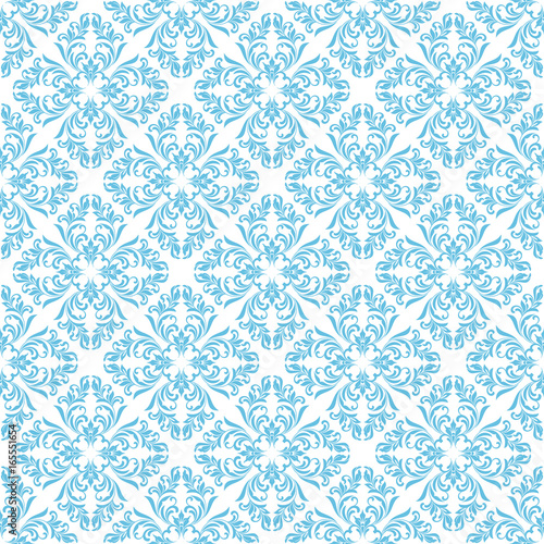 Seamless pattern. Ornate floral tracery on a white background. Ideal for textile print and wallpapers. © irina_omelchak