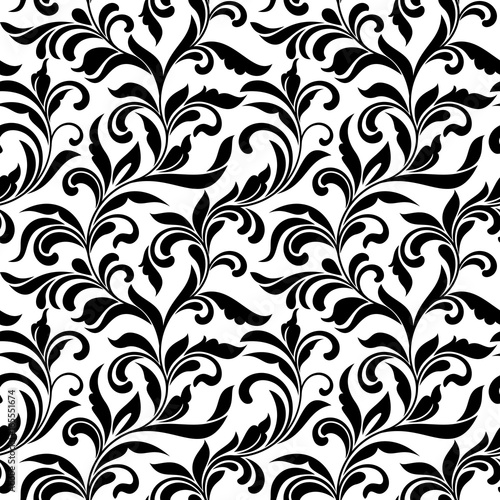Elegant seamless pattern. Tracery of swirls and decorative leaves isolated on a white background. Vintage style. It can be used for printing on fabric, wallpaper, wrapping