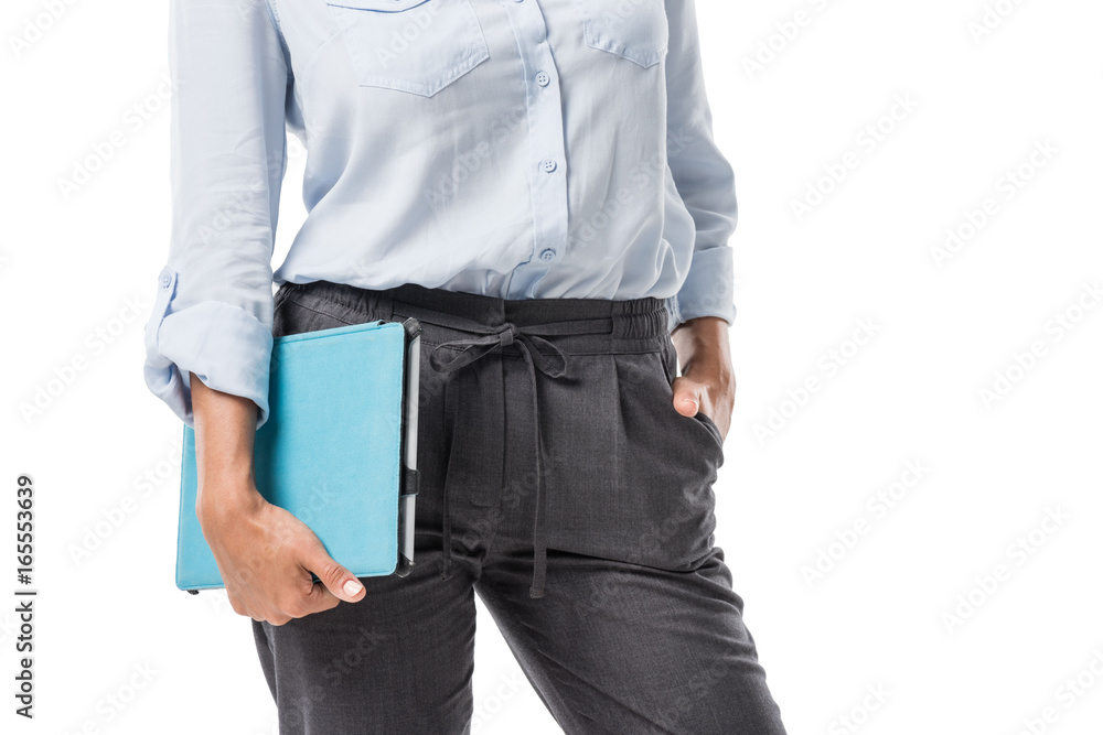 partial view of businesswoman in formal wear holding tablet in hand isolated on white partial view of businesswoman in formal wear holding tablet in hand isolated on white