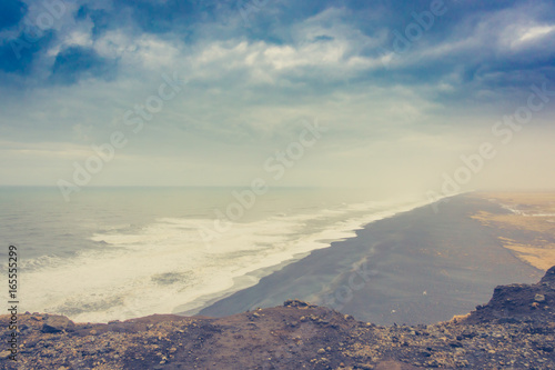 Black beach in Iceland, Winter season . ( Filtered image processed vintage effect. )