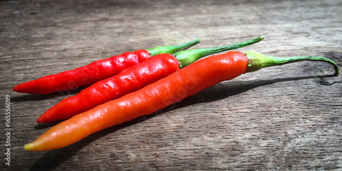 Fresh chillis on wood