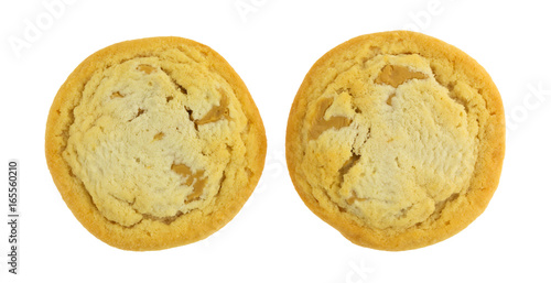 Photography Top view of two chunky peanut butter cookies isolated on a white background