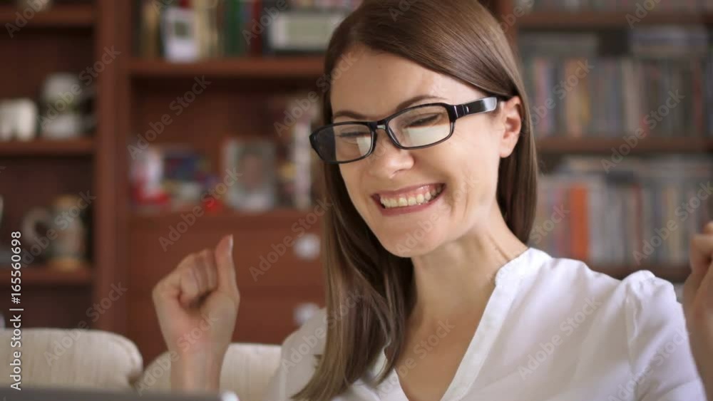 Young successful businesswoman using laptop at home living room home office, professional female employer receiving good news excited happy cheerful smiling. Success and achievement concept Young successful businesswoman using laptop at home living room home office, professional female employer receiving good news excited happy cheerful smiling. Success and achievement concept