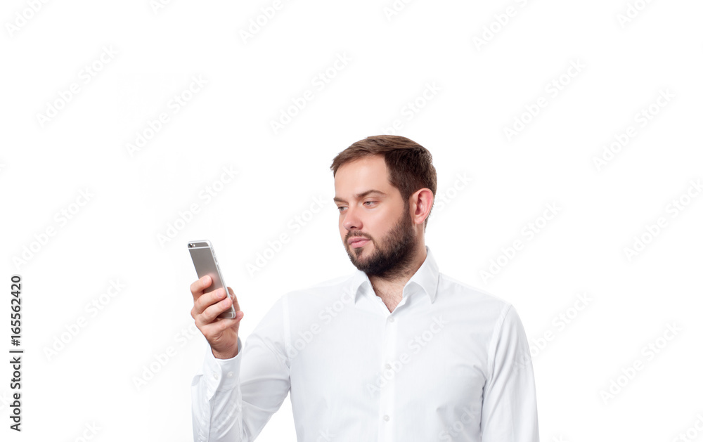 Business man holding smartphone on white background