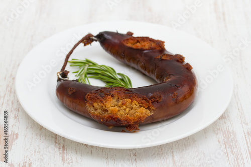 fried smoked sausage on white plate