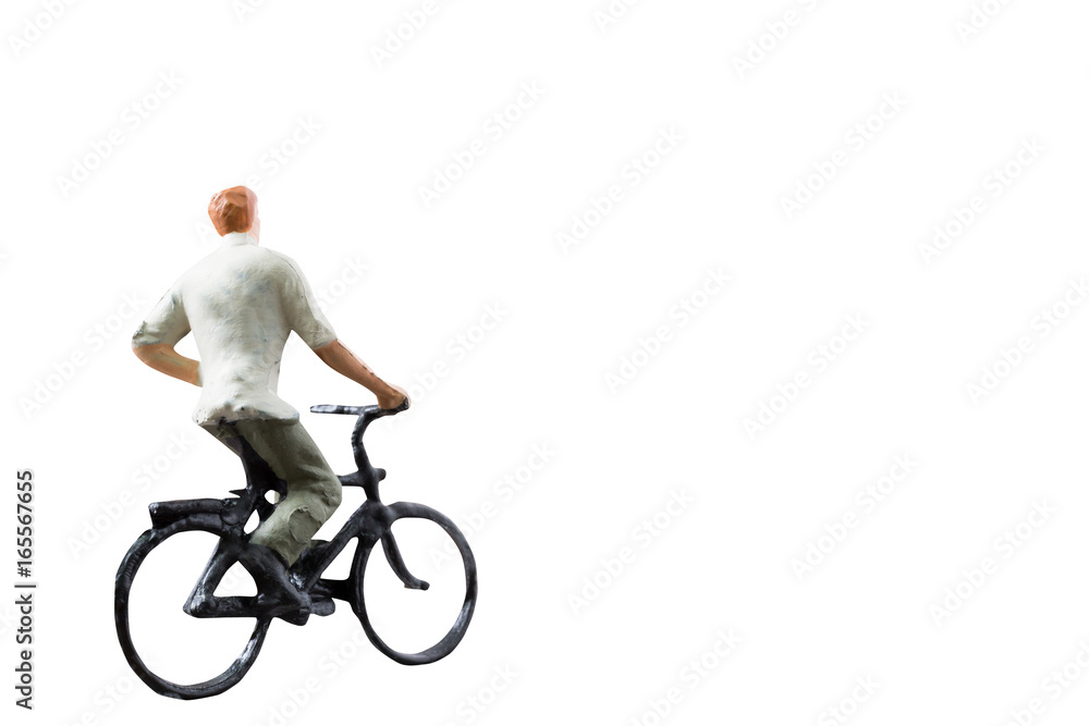 Miniature figure ride bicycle isolated on white background with clipping path Miniature figure ride bicycle isolated on white background with clipping path