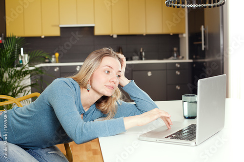Woman with laptop relaxing