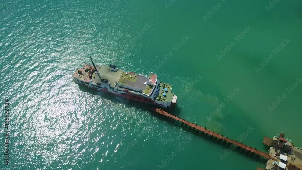 Aerial View of Ferry Leaving Port in Tropical Country Aerial View of Ferry Leaving Port in Tropical Country