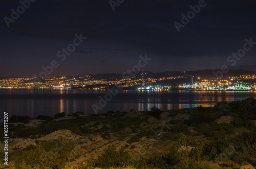 Rijeka refinery in the night with Rijeka city on the background. View from Krk / Croatia