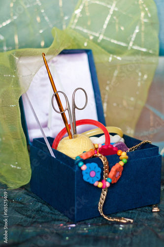 Blue box with accessories for needlework