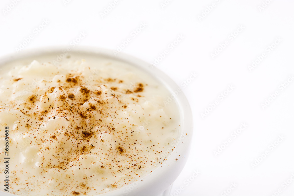 Arroz con leche. Rice pudding with cinnamon isolated on white background
Arroz con leche. Rice pudding with cinnamon isolated on white background