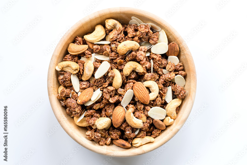 Bowl of Muesli and granola Isolated on White Top View. Bowl of Muesli and granola Isolated on White Top View.