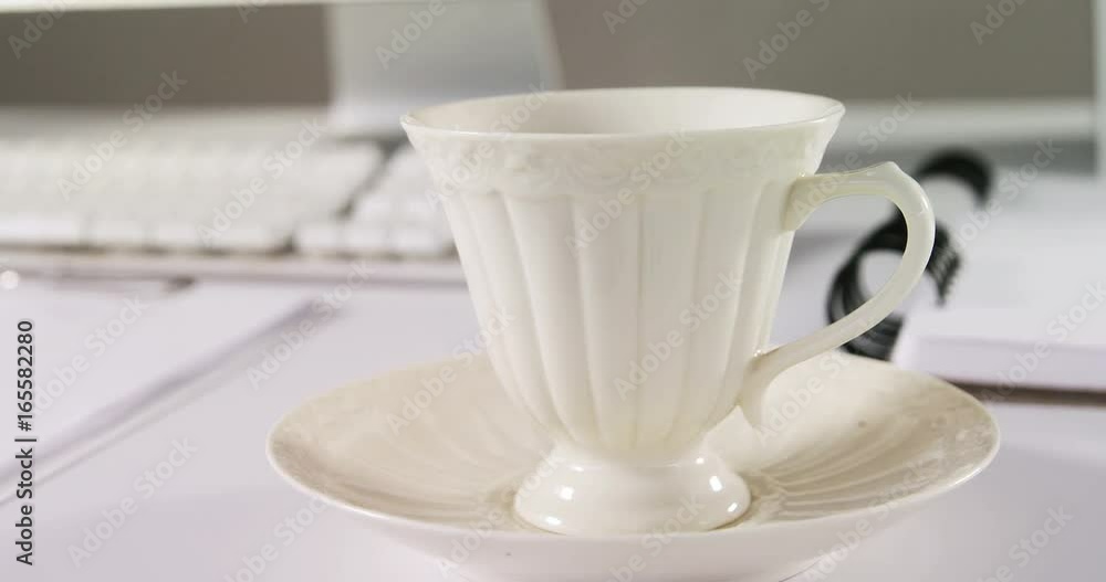 Cup of tea with saucer Cup of tea with saucer