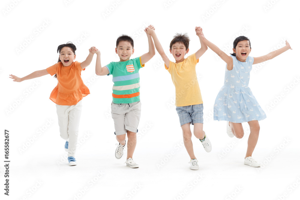 Cheerful school students hand in hand running Cheerful school students hand in hand running