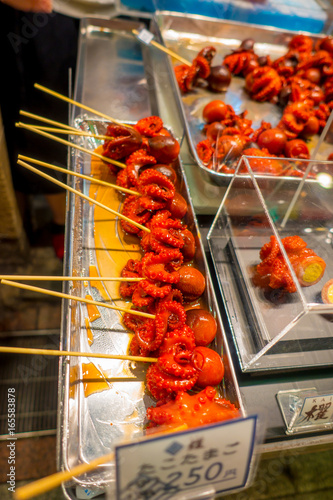 Boiled Tiny Octopus sold at Nishiki Market in Kyoto photo