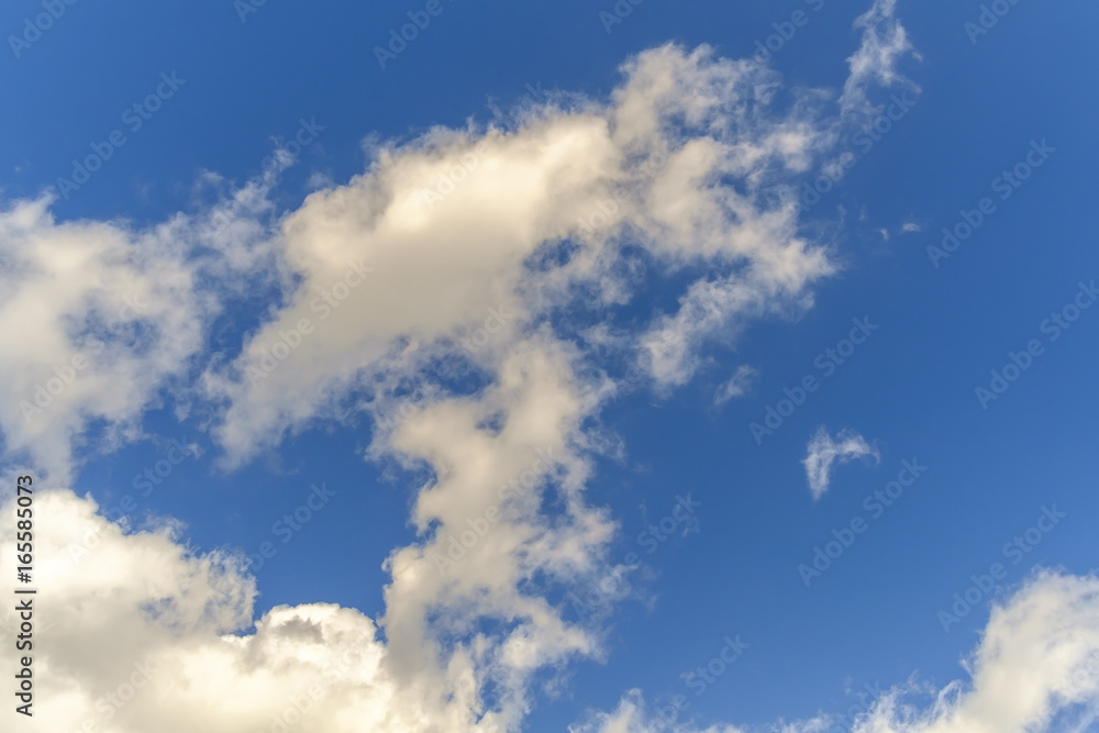 white cumulus clouds against blue sky white cumulus clouds against blue sky