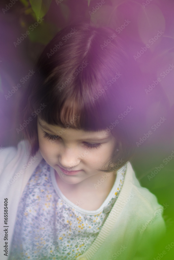 Pretty little girl on the meadow in spring day Pretty little girl on the meadow in spring day