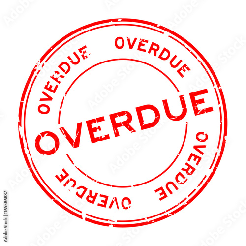 Grunge red overdue round rubber seal stamp on white background