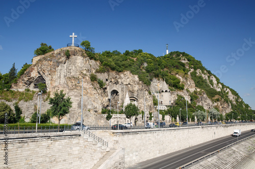Photography Cave church, cross and statue of Liberty on the Gellert Hill in Budapest