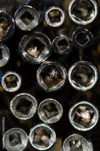 Abstract: View Into the Barrel of a Set of Antique Pocket Watch Keys