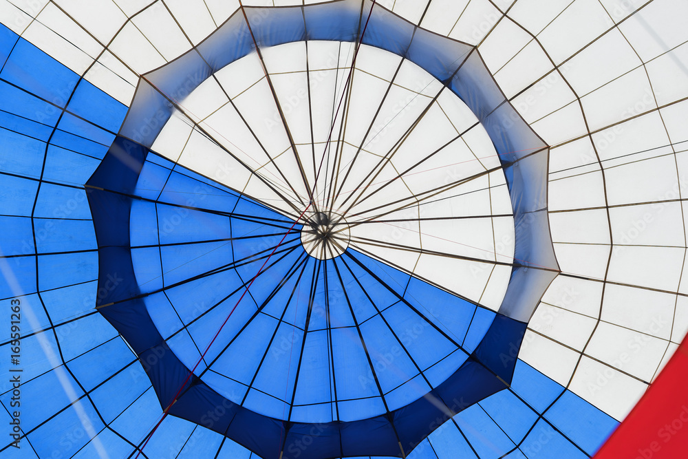 Naklejka premium Abstract surface texture of hot air balloon close-up. Bright colors. Background for bright moments of life