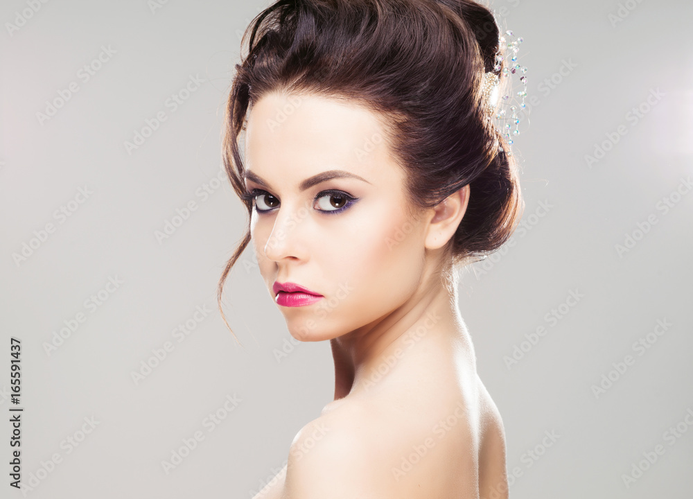 Portrait of gorgeous brunette wearing luxury headband over isolated background. Portrait of gorgeous brunette wearing luxury headband over isolated background.