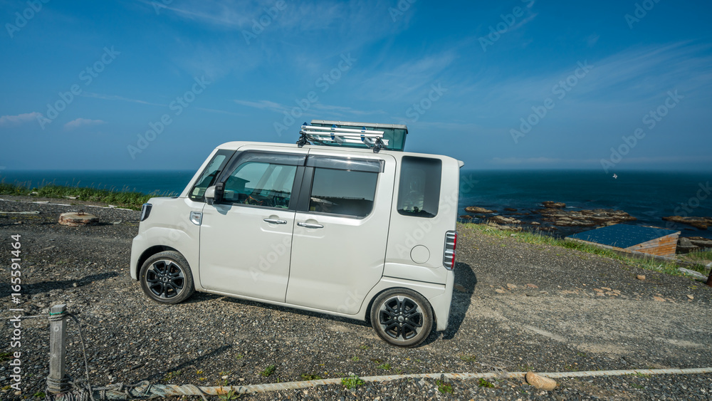 White Car Parked On Natural Viewpoint In Japan White Car Parked On Natural Viewpoint In Japan
