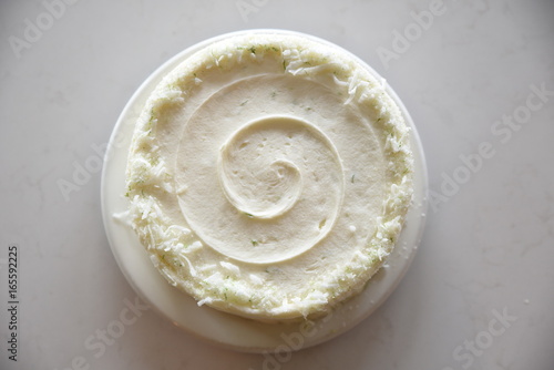 Cake decorated with white swirled frosting