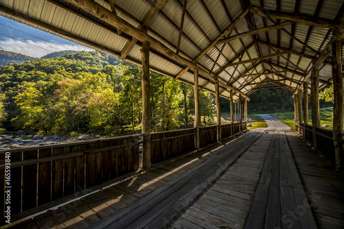 old wooden covered bridge  © kevin