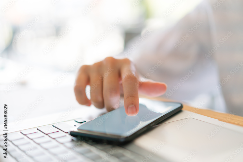 Business hand with mobile phone . Business hand with mobile phone .